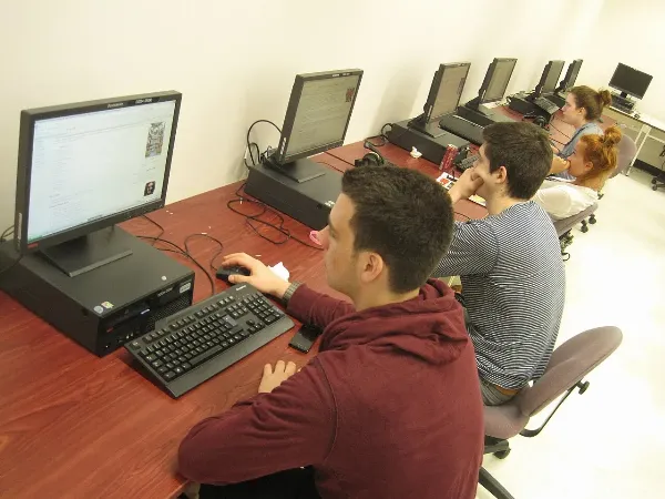 Students working at computers in a school computer lab