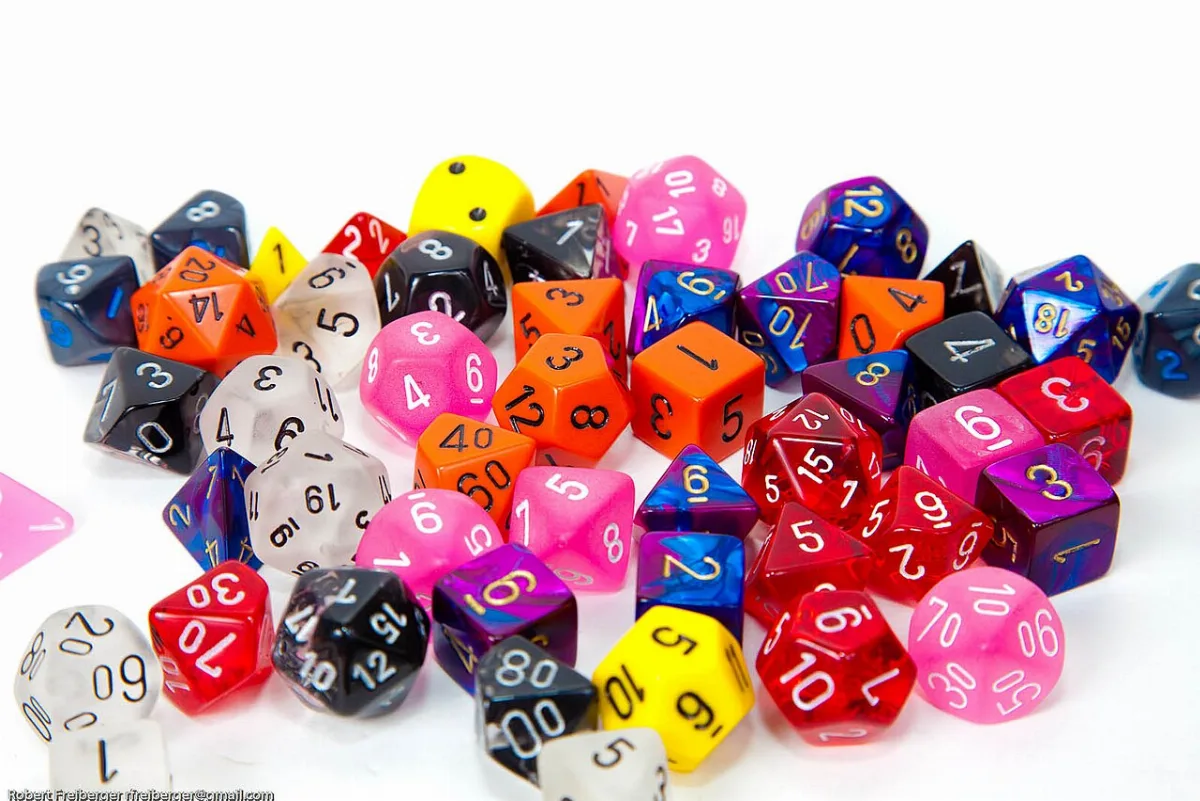 A pile of colorful game dice