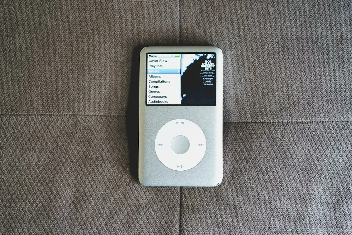 An iPod lying on a couch