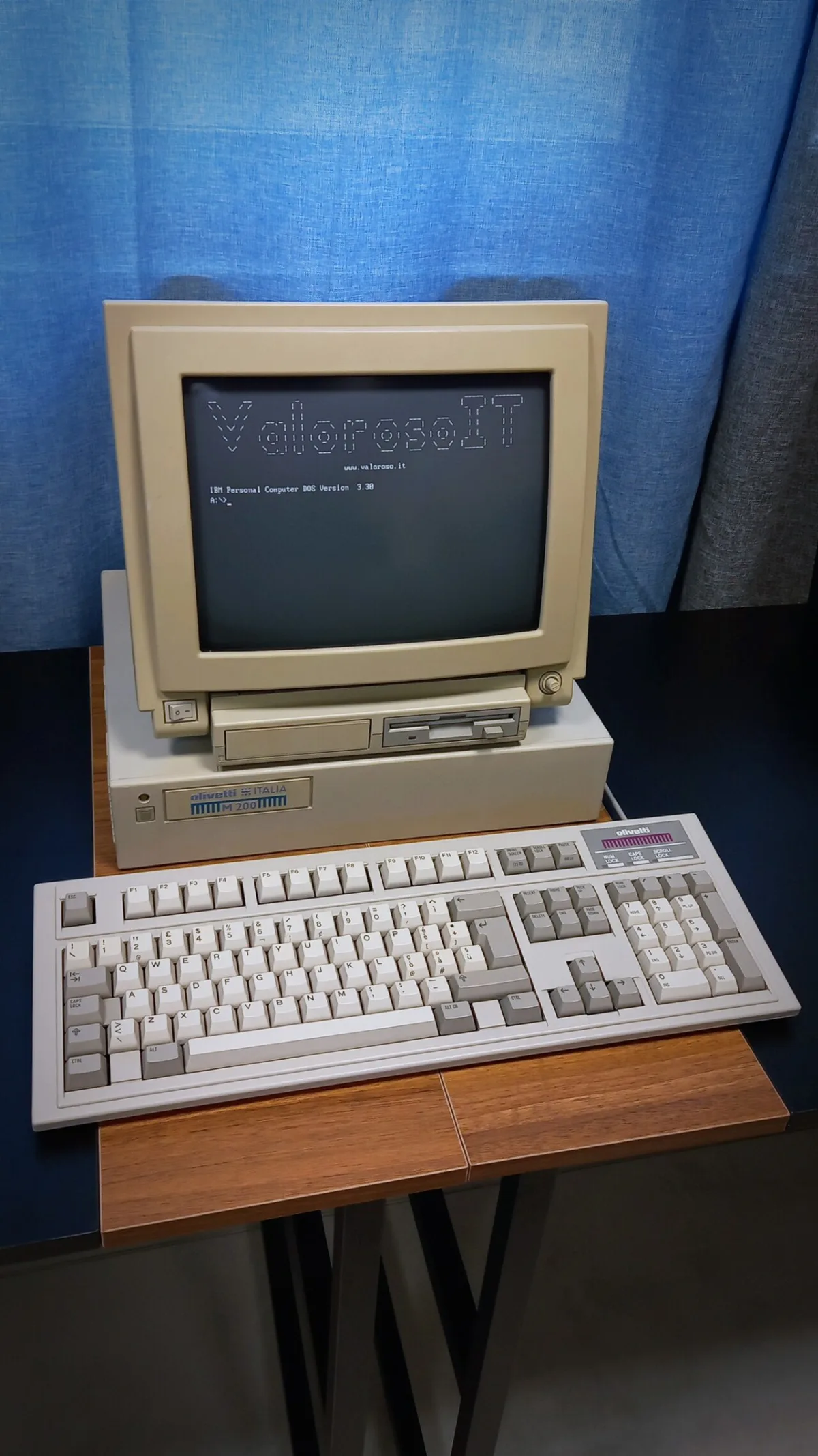 An old desktop computer with a CRT monitor and keyboard